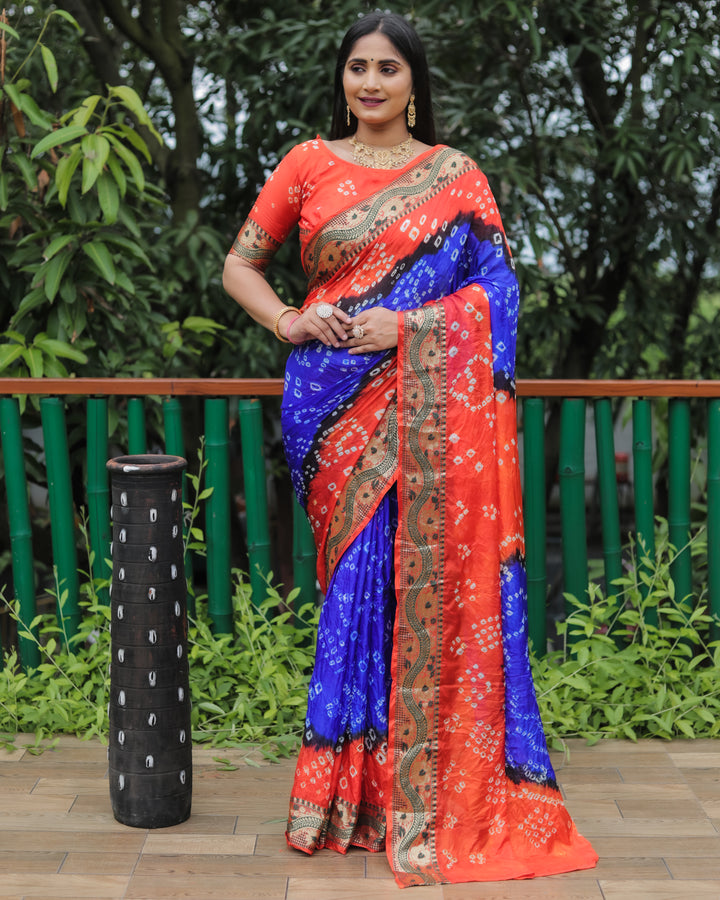 Timeless teal-green Bandhej Tapeta silk saree with dual-color design, ideal for grand occasions.