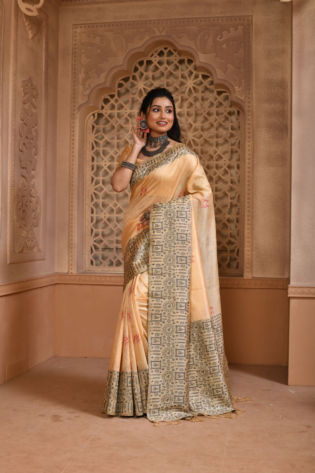 Elegant cream handloom raw silk saree with intricate pallu weaving, ideal for festive celebrations.