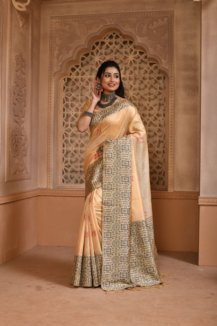 Elegant cream handloom raw silk saree with intricate pallu weaving, ideal for festive celebrations.