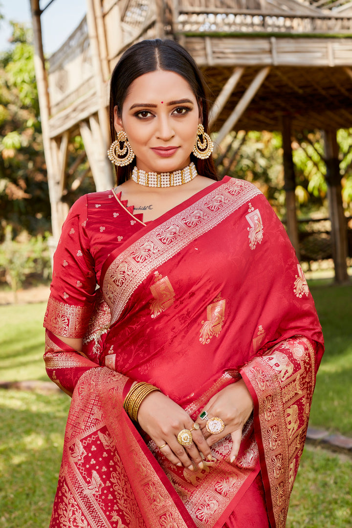 Beautiful navy satin Kanjivaram saree with vibrant elephant border, perfect for weddings and cultural celebrations.