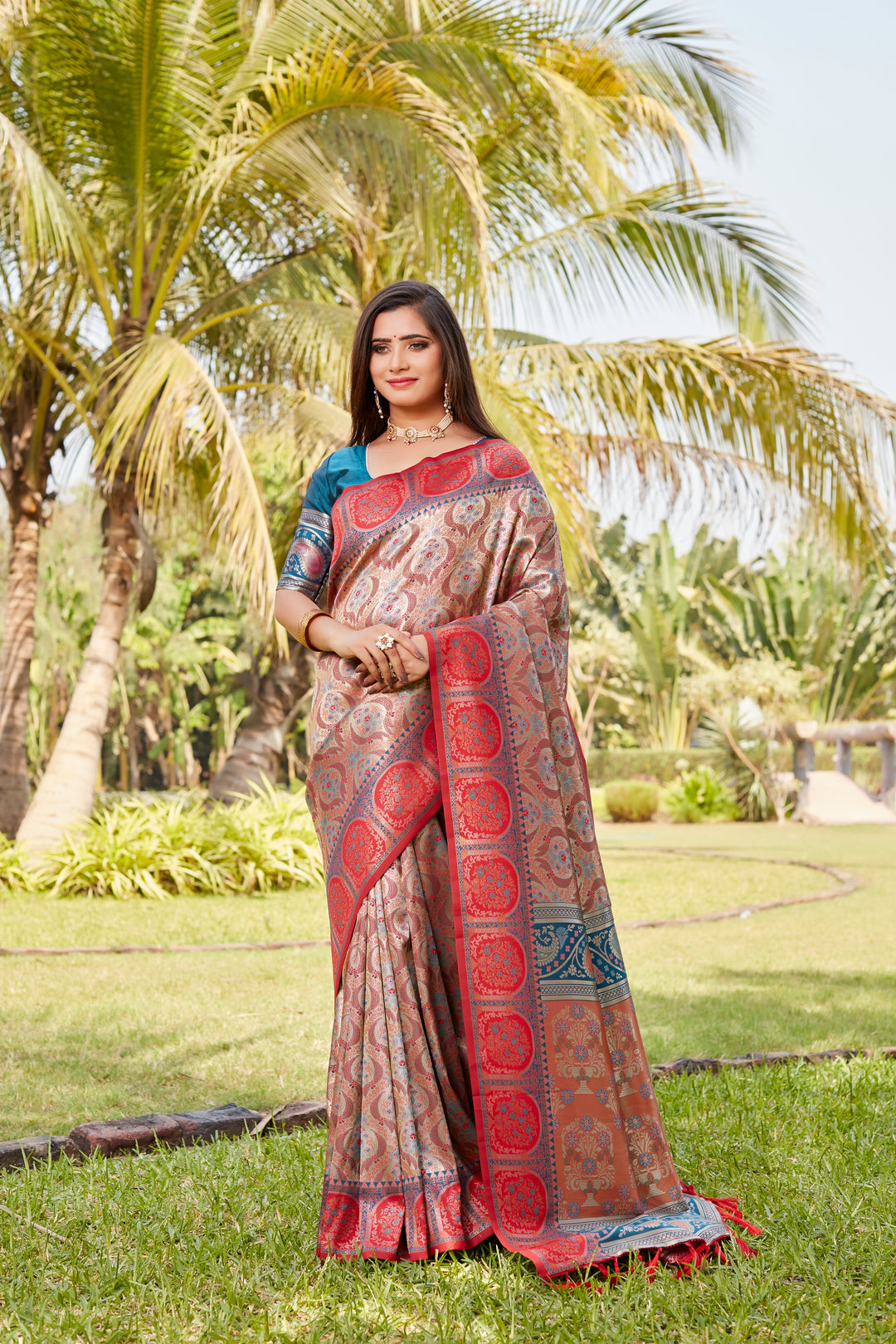 Elegant teal Kanjivaram silk saree featuring rich pallu and intricate detailing for festive occasions.