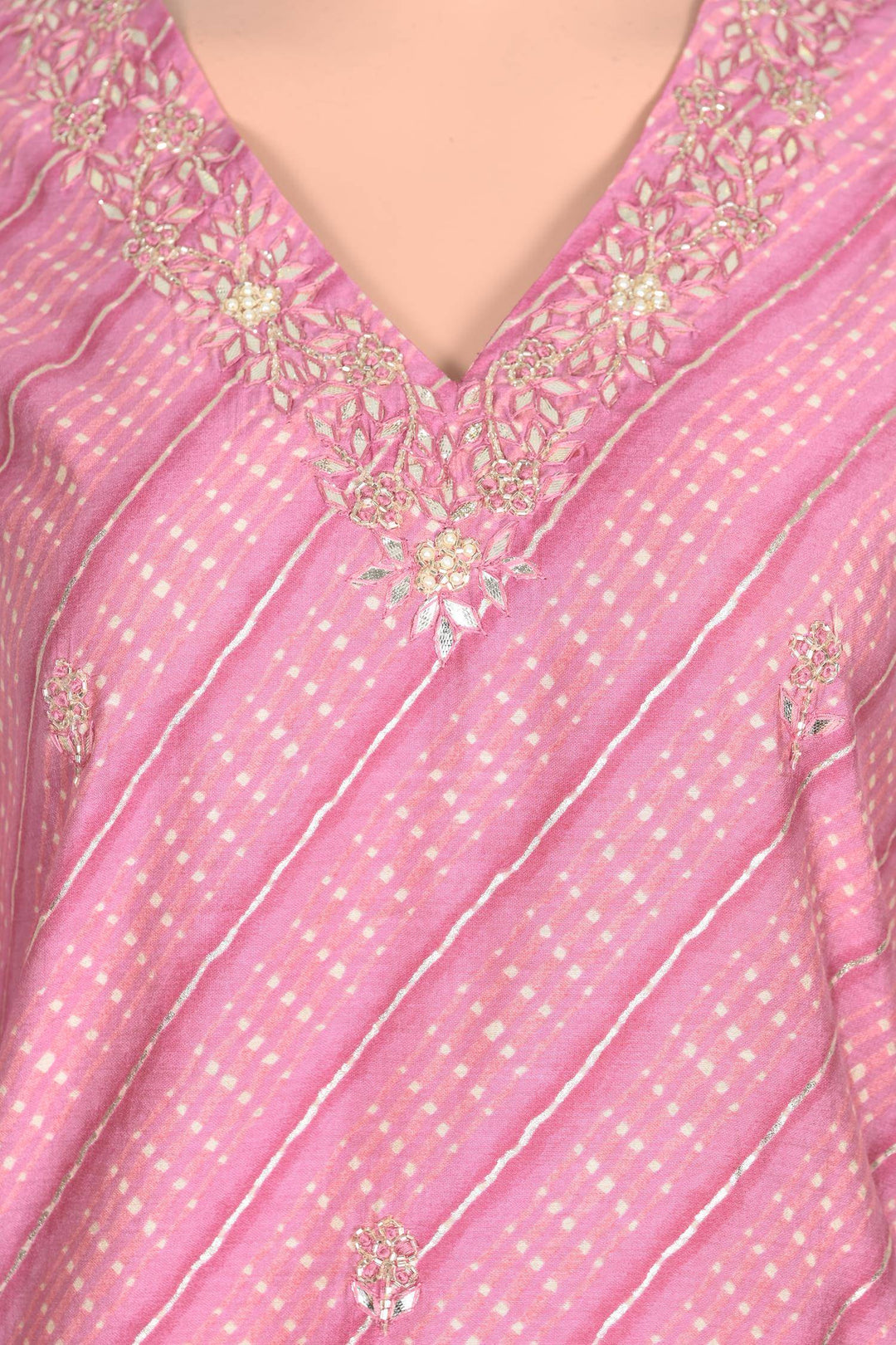 Chic light pink kurti set with an elegant muslin kurta and sequins, ideal for adding a touch of sparkle to your wardrobe