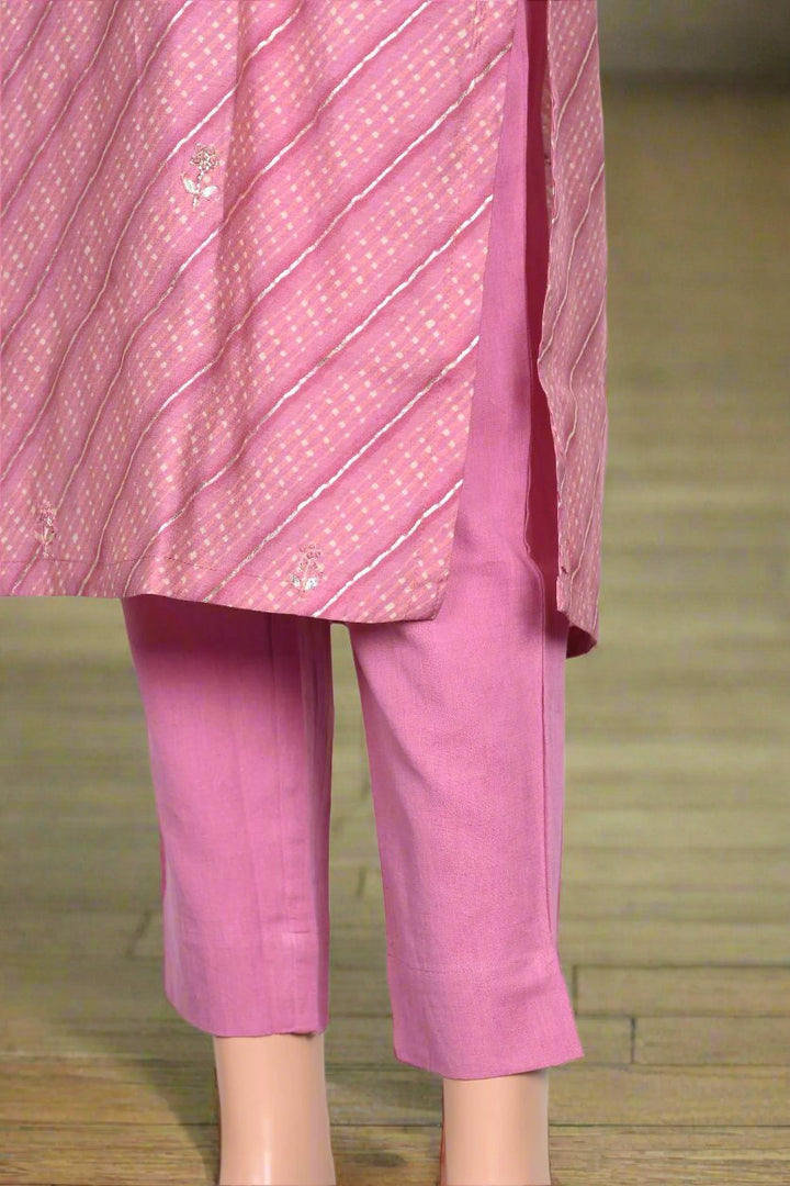 Elegant light pink kurti set with a sequined muslin kurta, ideal for women seeking comfort and style in their ethnic wear