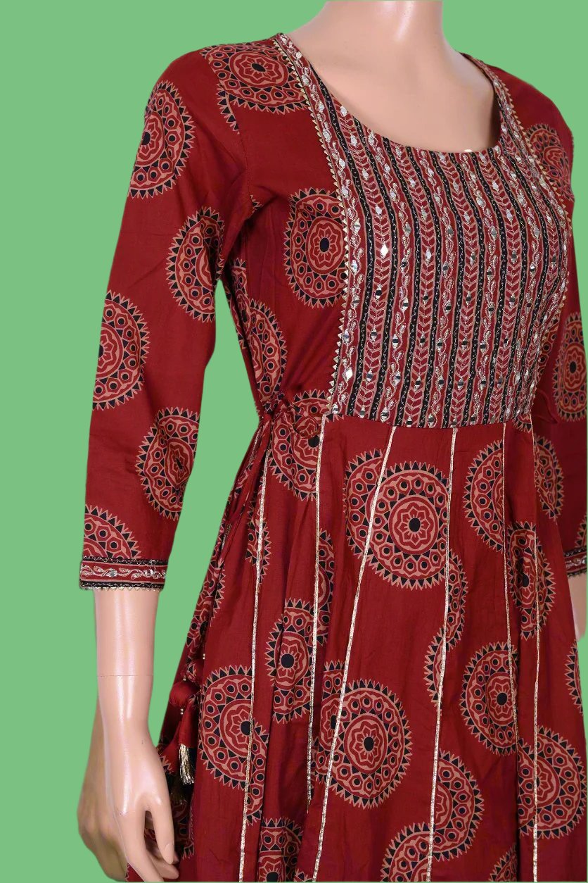 Trendy maroon Anarkali frock showcasing intricate Ajrakh print, designed as a comfortable kurta pant set for casual and festive wear