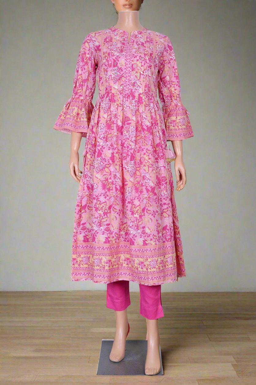 Elegant pink floral kurti designed for women, offering comfort and style for everyday wear and casual outings.