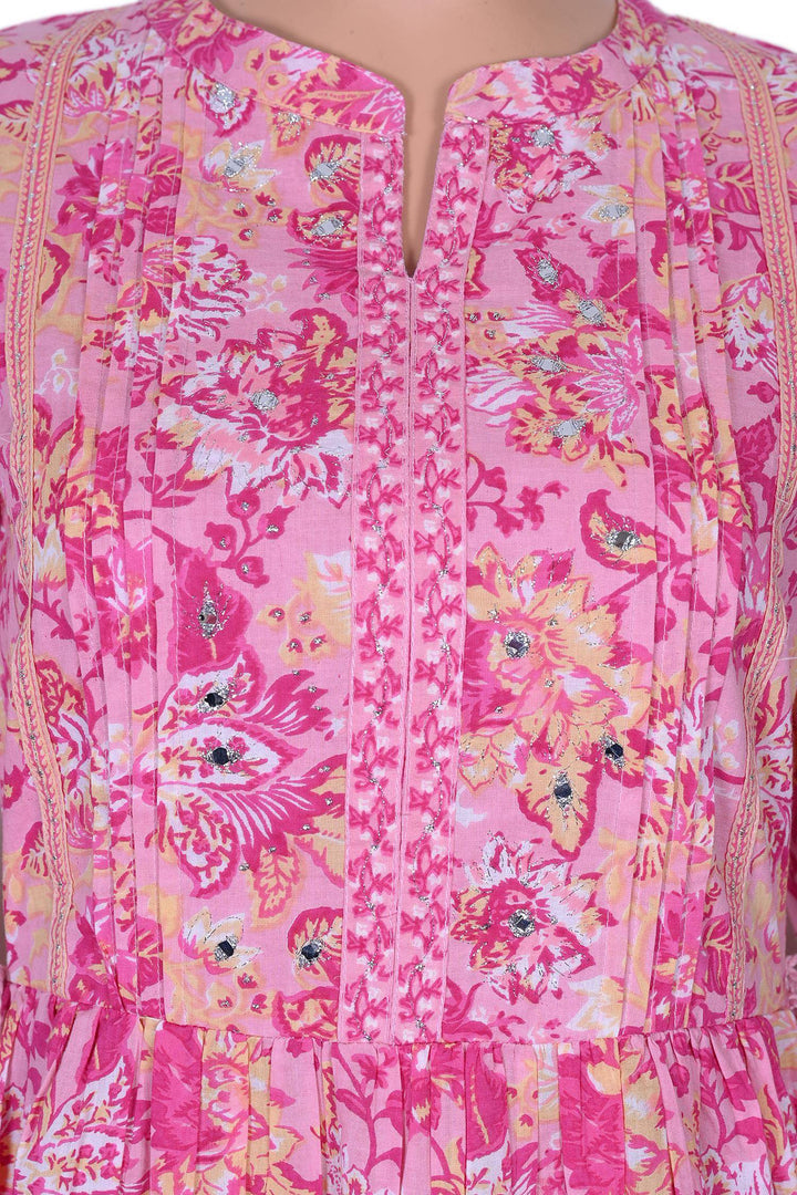 Chic pink floral kurti perfect for women, combining comfort and style for an ideal outfit for daily activities.