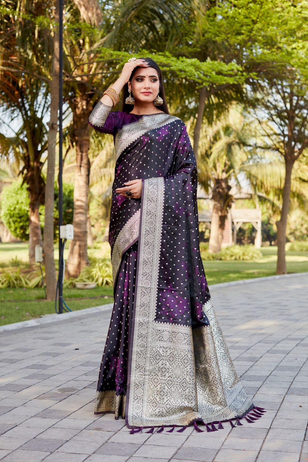 Dark-purple Soft Satin Kanjivaram saree with luxurious butta detailing and soft shimmer.