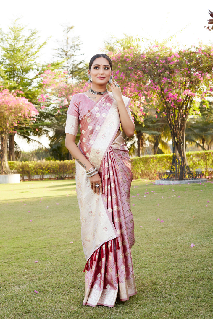 Elegant pink saree in Kanjivaram Soft Satin Silk with shimmering finish, featuring detailed weaving butta work.