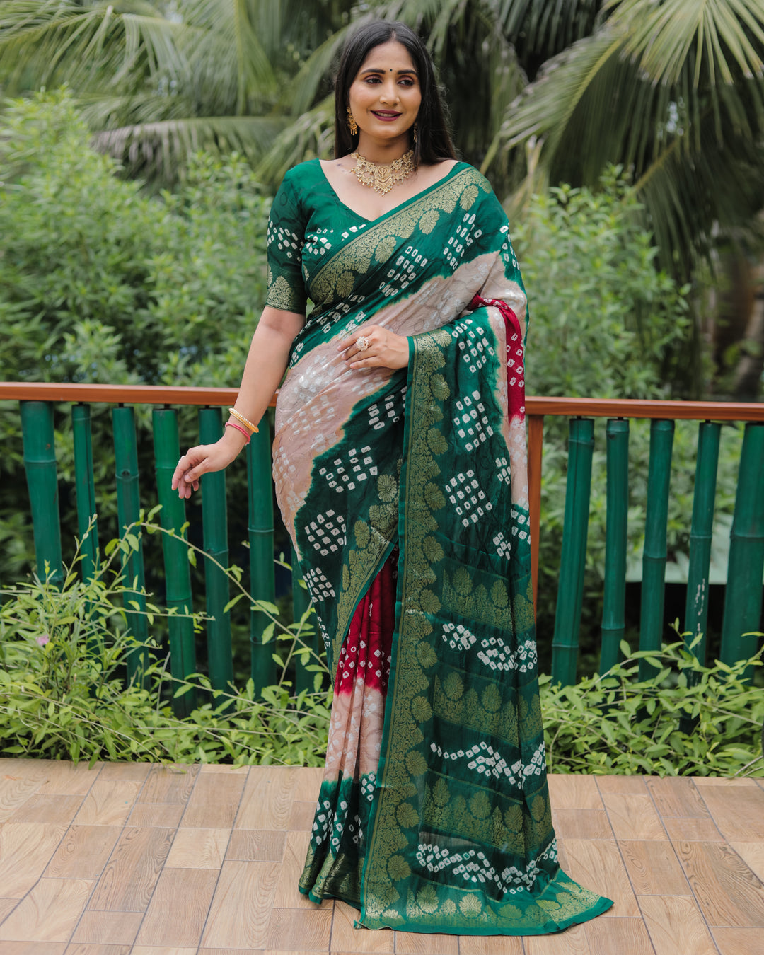 Gorgeous Green Bandhej Silk Saree with a stunning designer zari border and woven pallu.