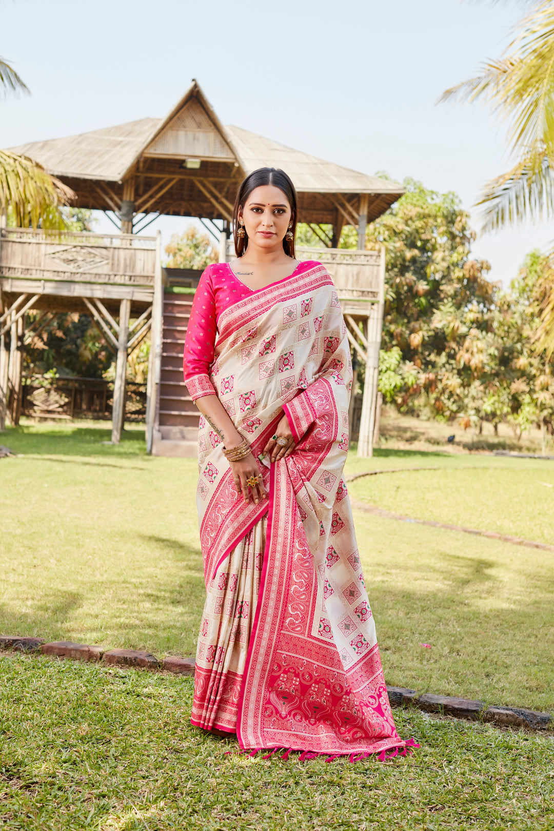 Rich green Kanjivaram soft silk saree with designer borders and exquisite traditional patterns.