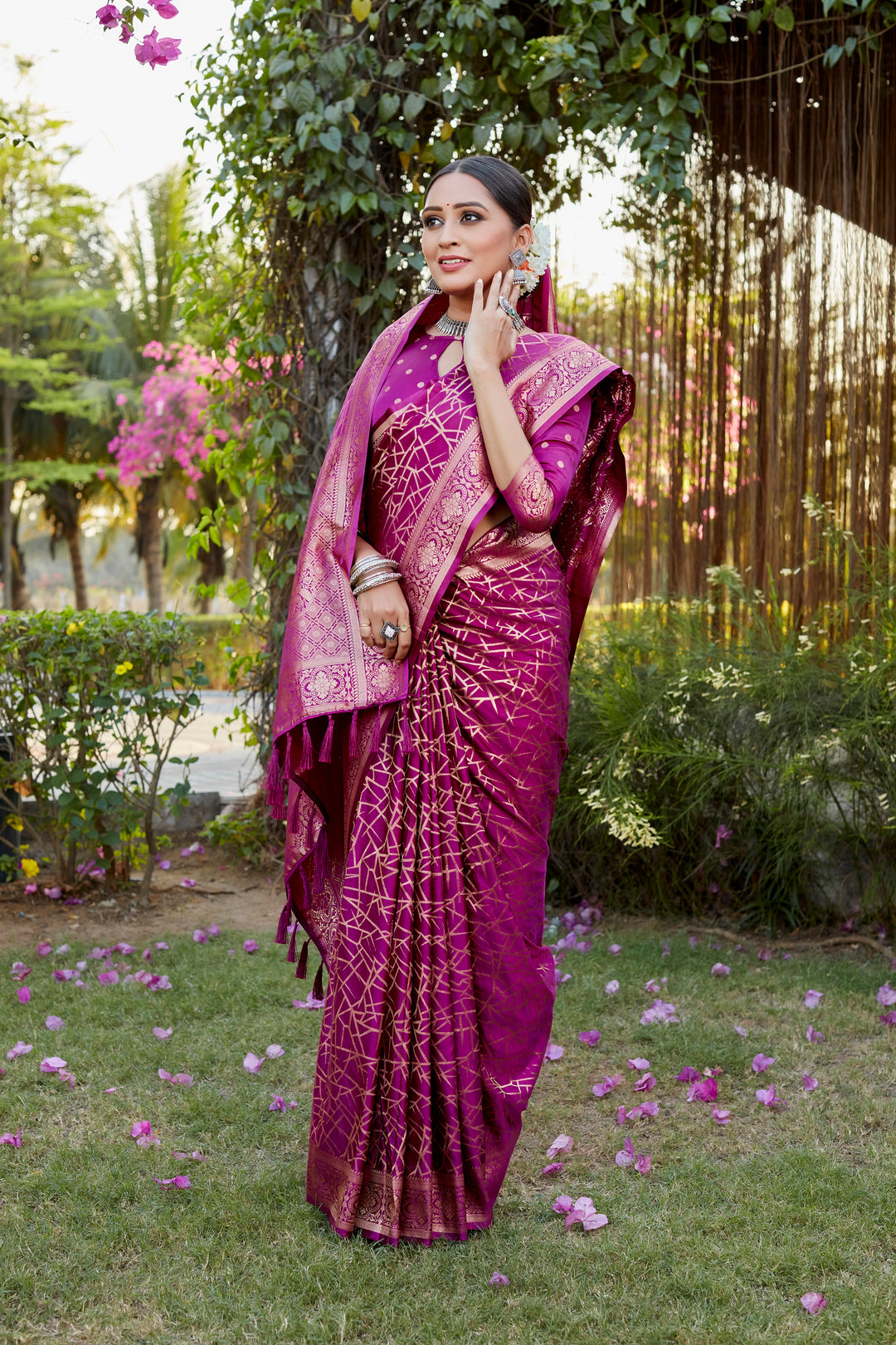 Stunning pink Kanjivaram soft satin silk saree with intricate butta work, ideal for luxury events and parties.