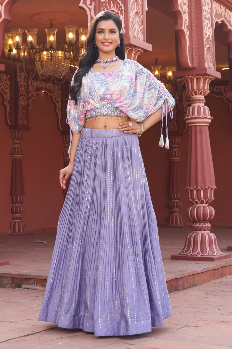 Stylish purple floral crop top and skirt lehenga set made from chinon fabric, perfect for weddings and parties.