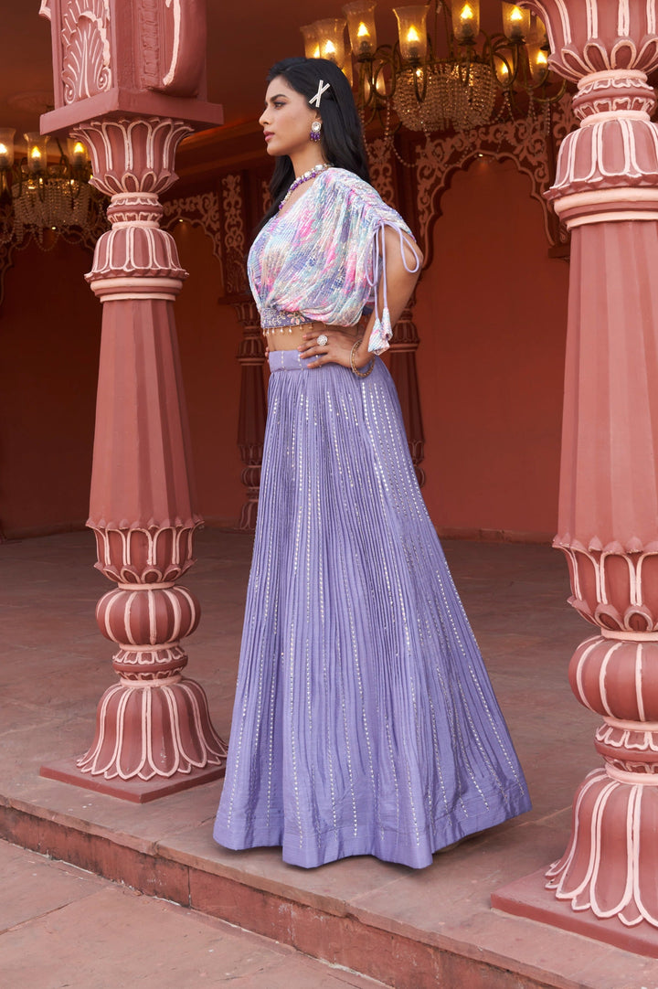 Beautiful purple crop top lehenga crafted from soft chinon fabric, designed for stylish and comfortable wear.