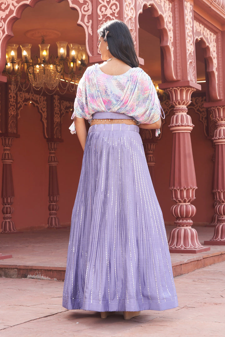 Gorgeous purple floral lehenga with a trendy crop top, designed for stylish celebrations.