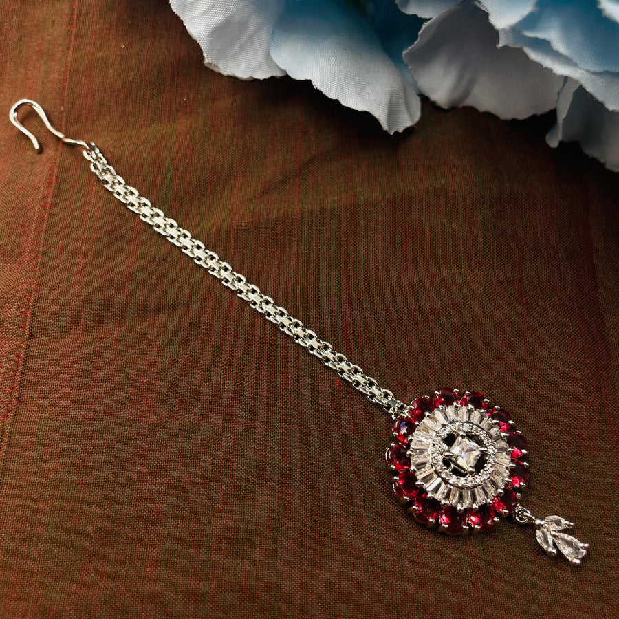 Chic Silver AD diamond maang tika that adds sparkle to any wedding look.