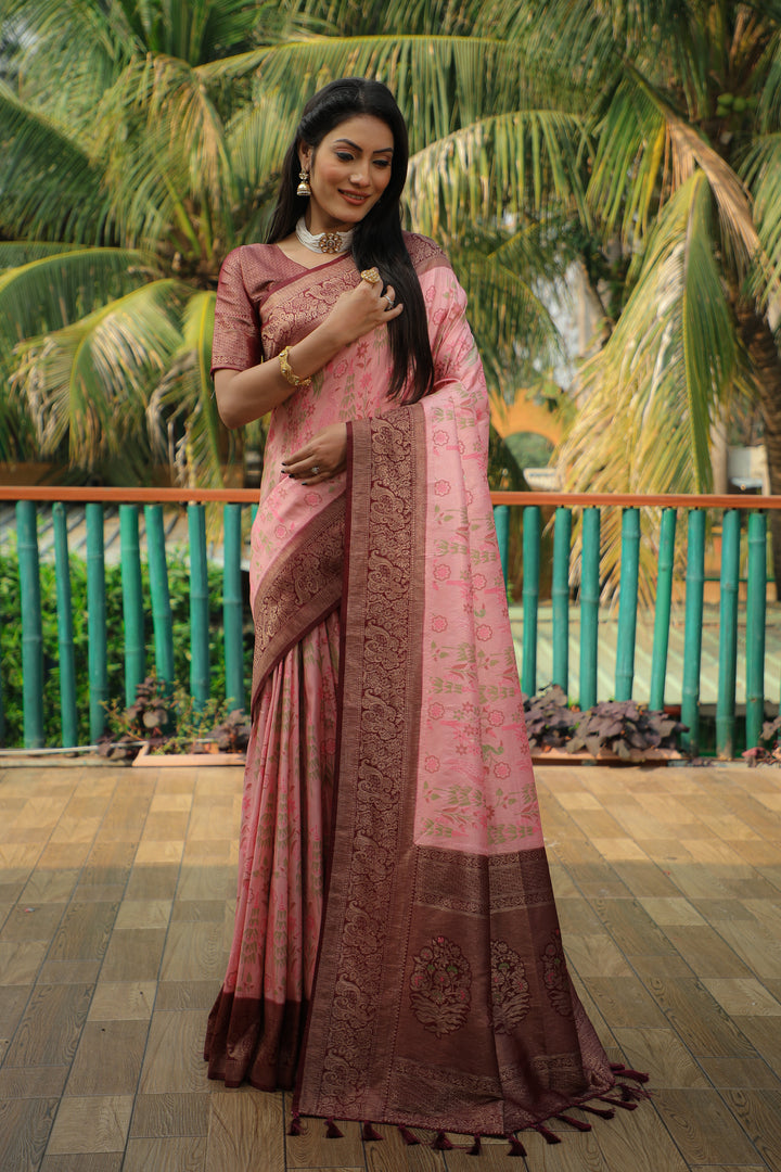 Elegant pink Kanjivaram soft silk saree with intricate weaving and a heavy blouse for luxurious celebrations.