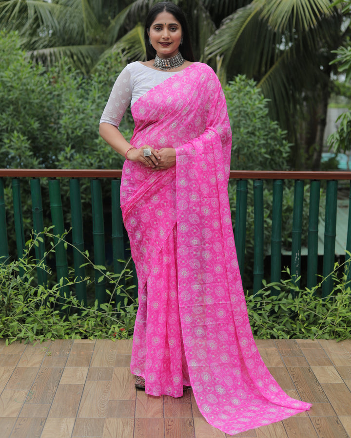 Lovely pink chiffon saree with luxurious foil work, a beautiful choice for weddings and parties.