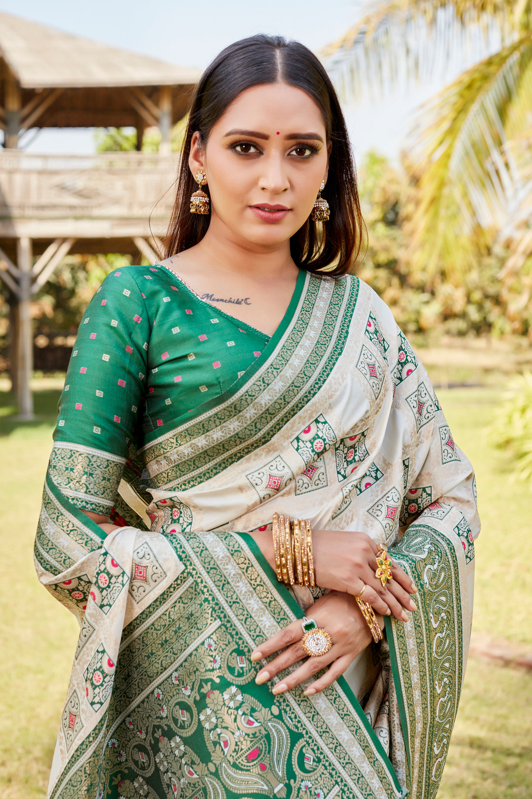 Stunning green Kanjivaram soft silk saree with designer borders and luxurious traditional motifs.