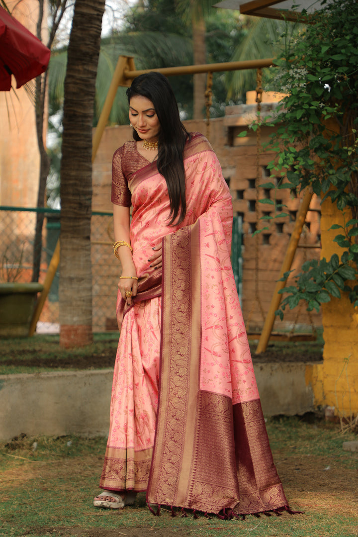 Elegant pink Indian saree, designed with beautiful Kanjivaram work for a traditional and festive look.