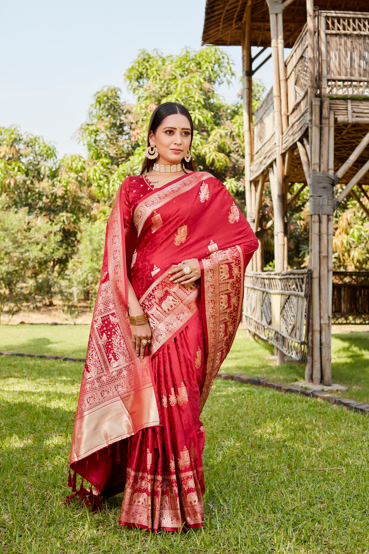 Stunning red satin Kanjivaram saree featuring a beautiful elephant border, ideal for bridal wear and special events.