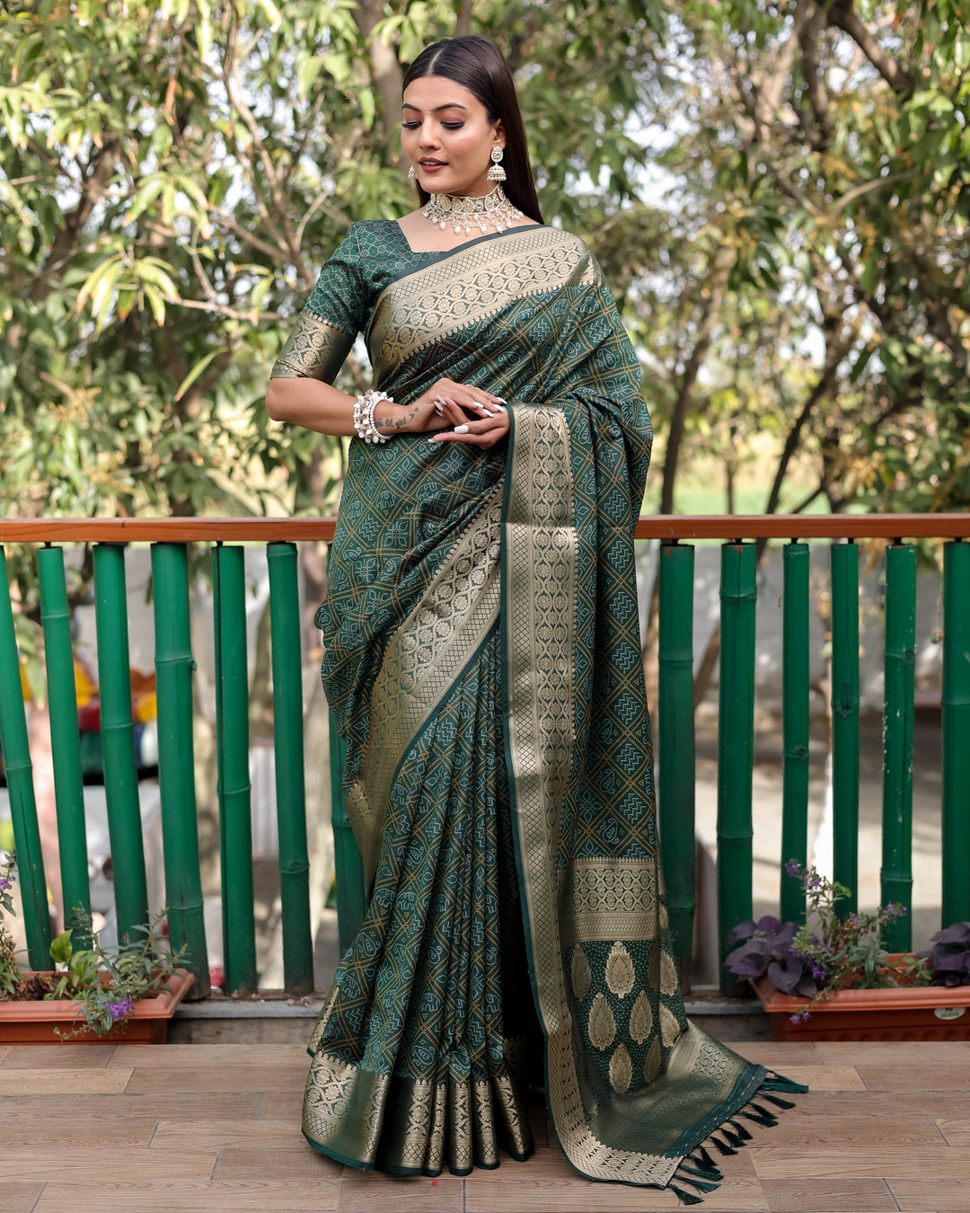 Elegant green saree with luxurious zari detailing, perfect for cultural celebrations and festive occasions.