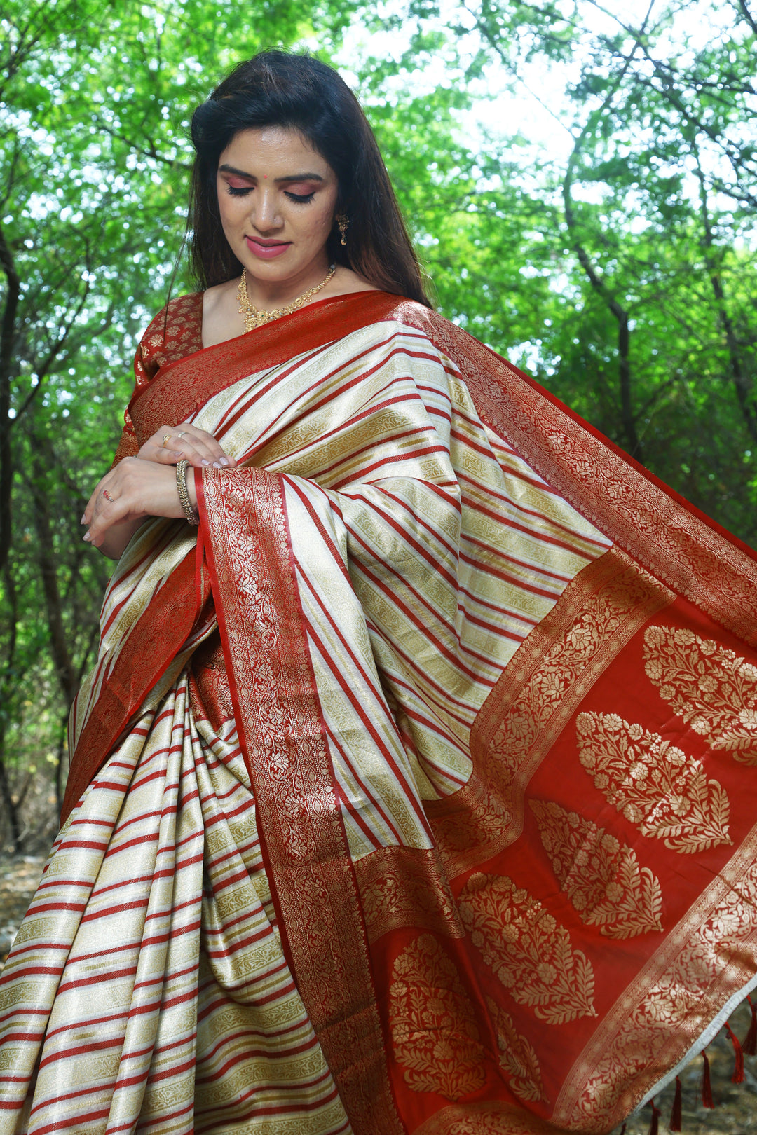 Premium Cream Leheriya Soft Silk Saree with Zari woven pattern and elegant border for weddings and celebrations.