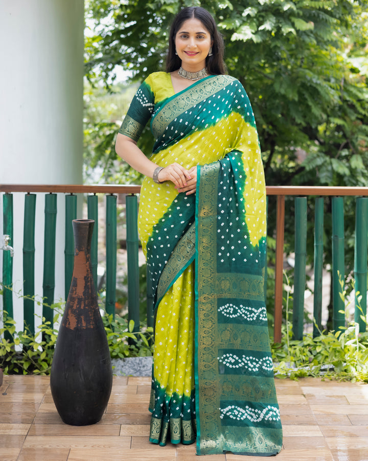 Vibrant green Bandhej silk saree with intricate zari work and matching blouse, perfect for traditional events.