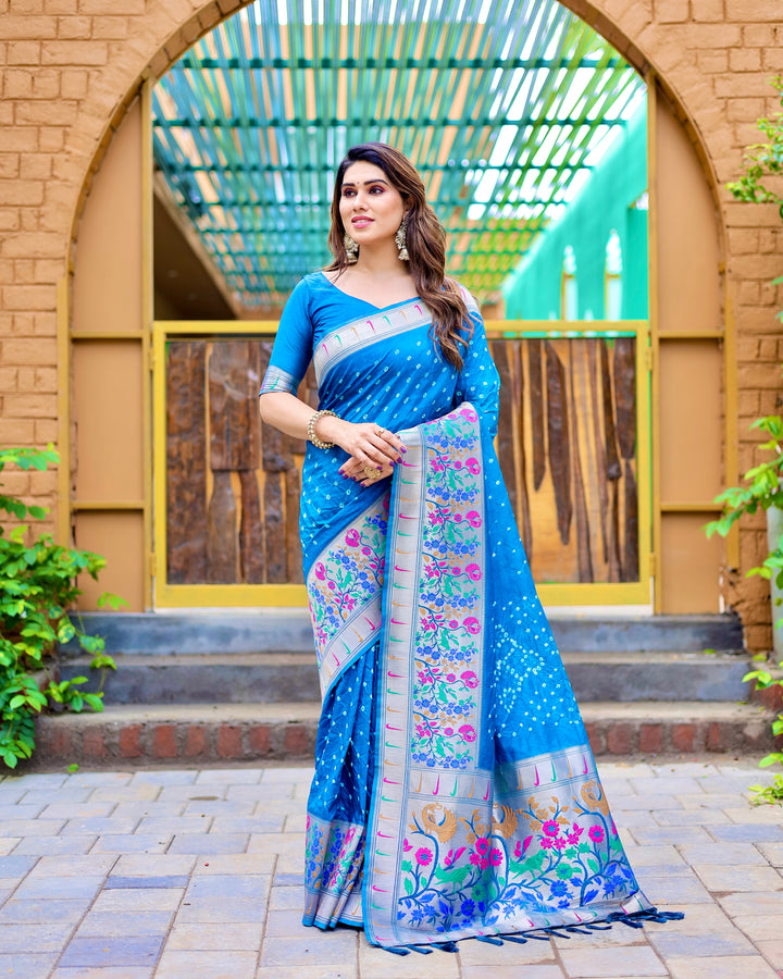 Blue Bandhej Paithani silk saree with a beautiful zari border and rich pallu, bringing out traditional elegance.