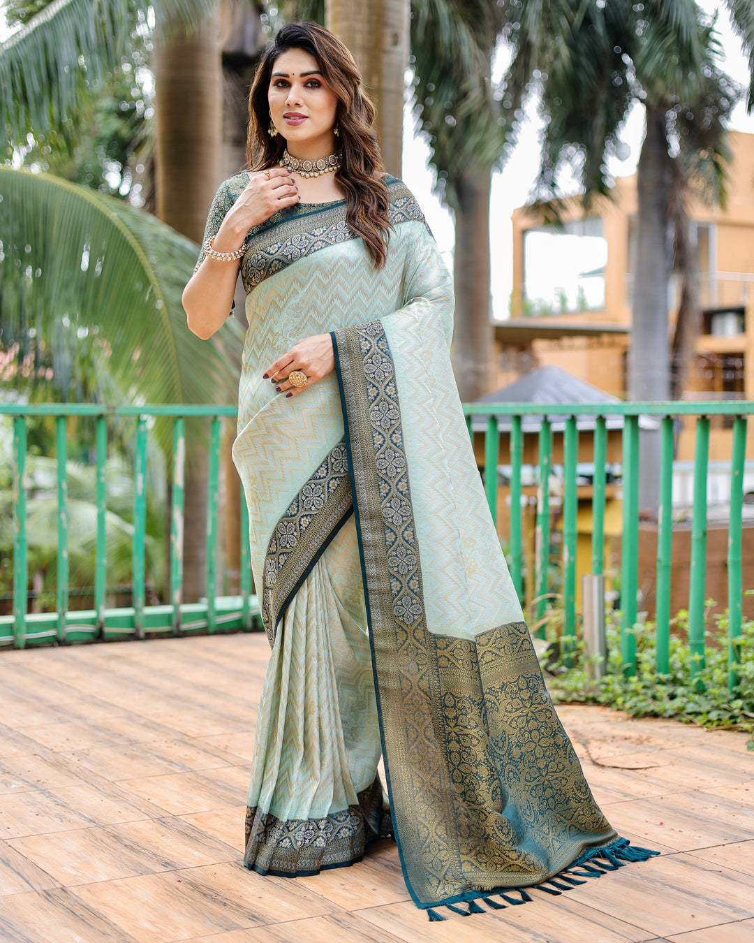 Light-Mint-Green Pure Kanjivaram Saree with beautiful Leheriya design and heavy border, perfect for traditional events.