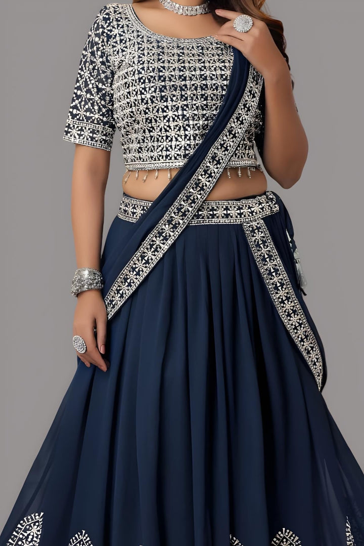 Gorgeous blue lehenga set featuring floral designs, perfect for celebrations.