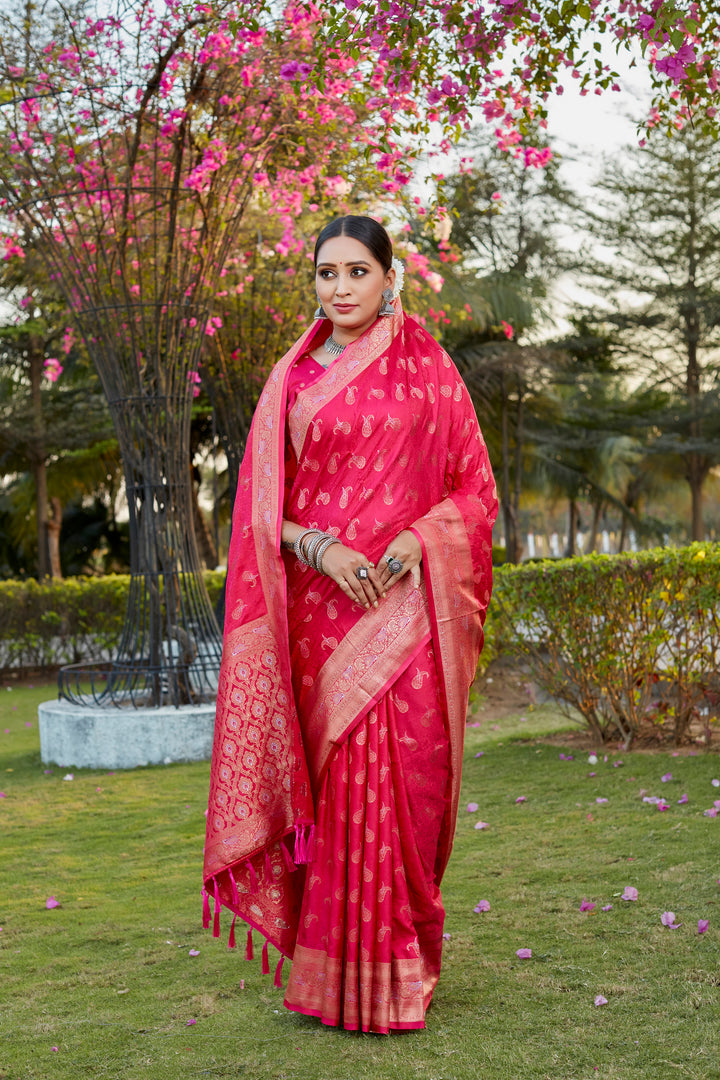 Elegant red Kanjivaram satin silk saree with beautiful butta designs and woven pallu, perfect for celebrations.