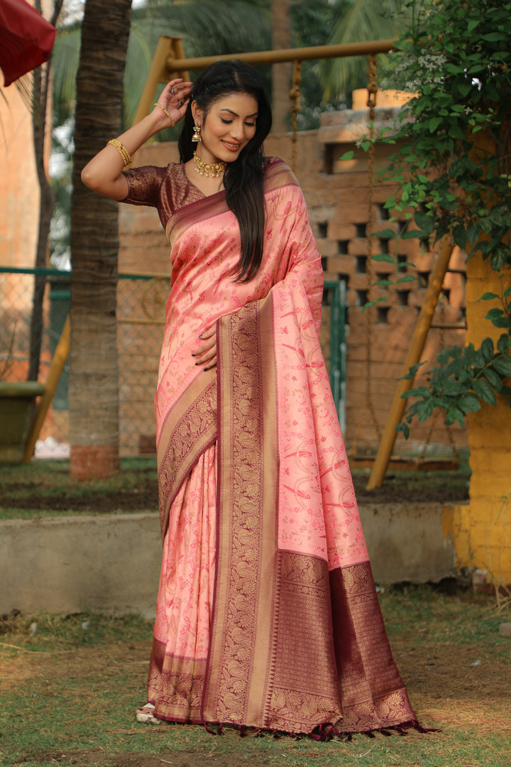 Traditional Kanjivaram saree in pink, ideal for weddings, crafted from soft silk for a sophisticated appearance.