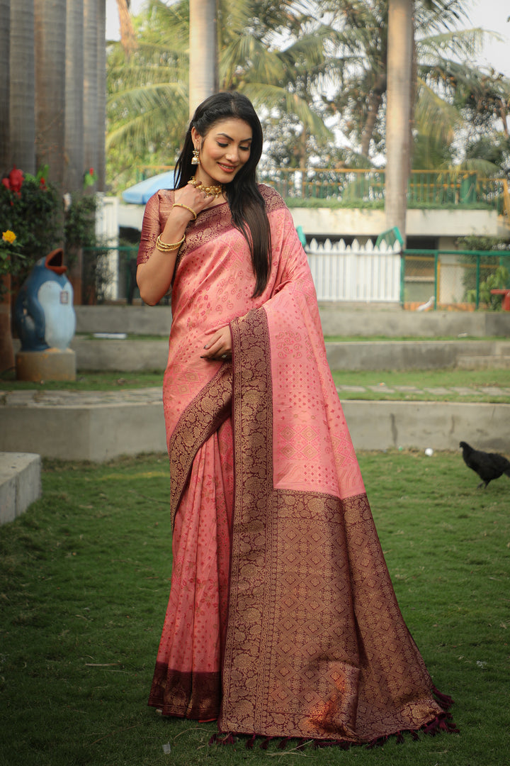 Pink Kanjivaram silk saree with rich, vibrant colors and stunning design for wedding festivities.