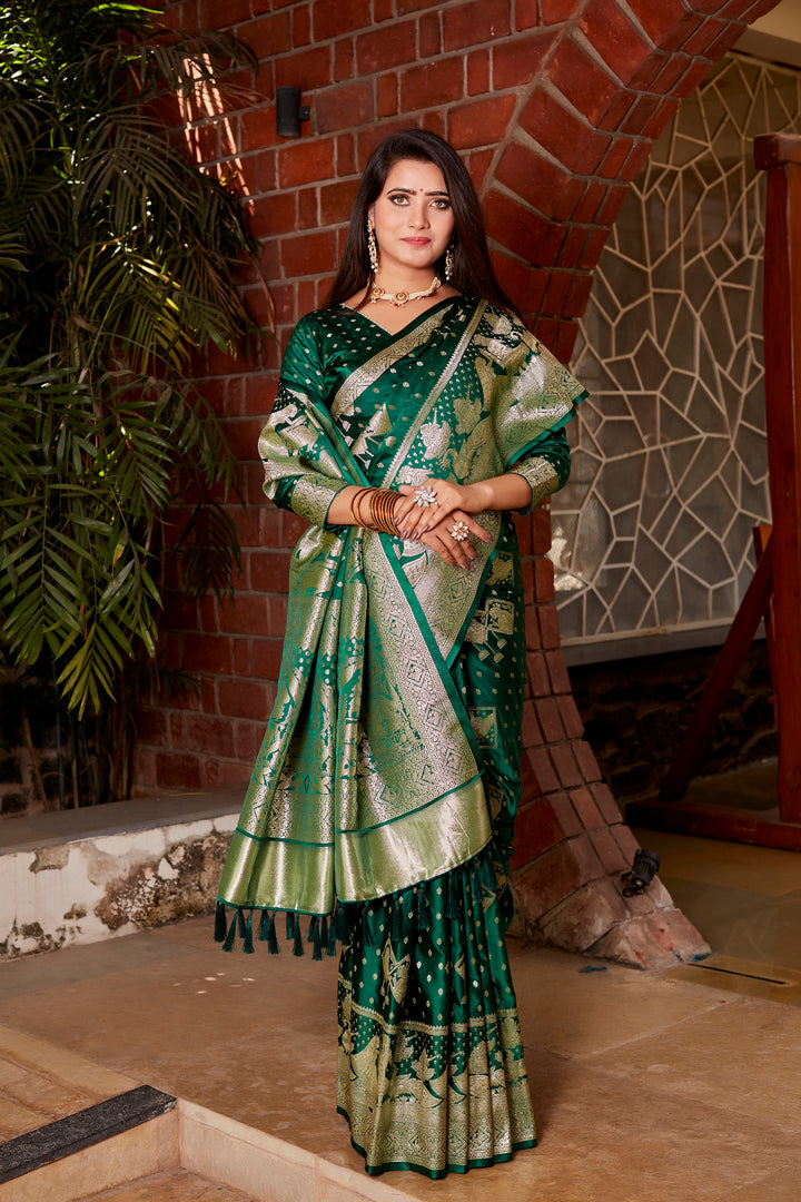 Elegant dark green Kanjivaram saree with fine craftsmanship and shimmering satin finish, perfect for weddings and other special events.