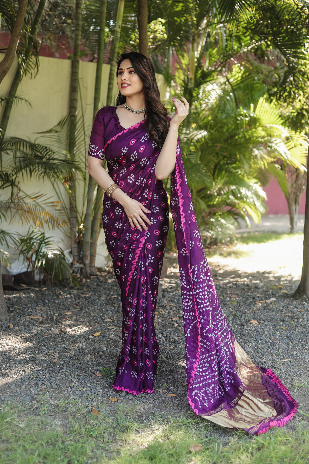 Classic Bandhej silk saree with intricate tissue pallu and beautiful zari work.