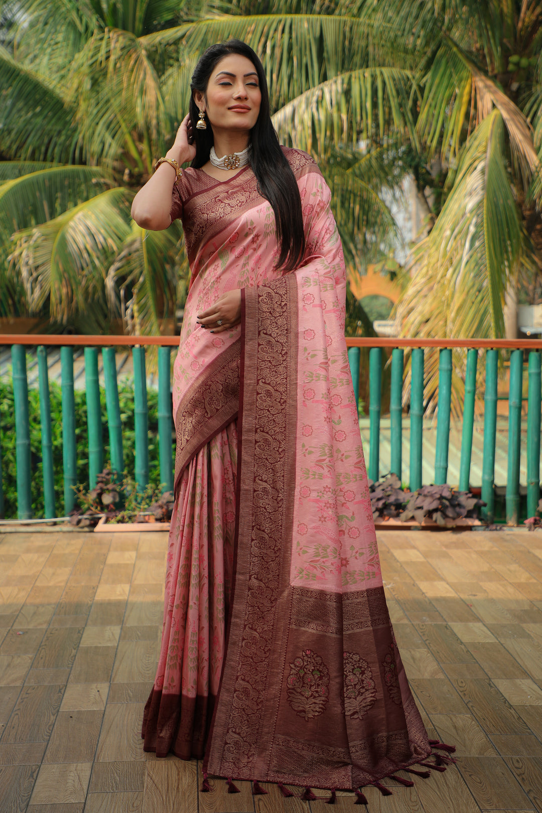 Beautiful pink Kanjivaram soft silk saree with a heavy blouse, ideal for festive and bridal wear.