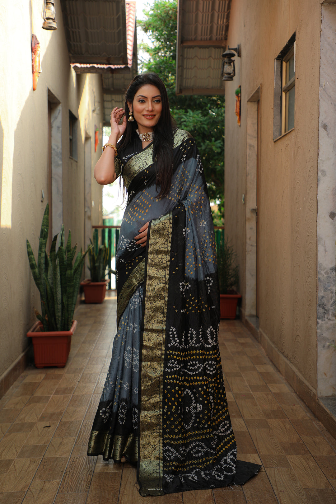 Festive-ready Bandhej Tapeta saree in green, offering timeless elegance and comfort.