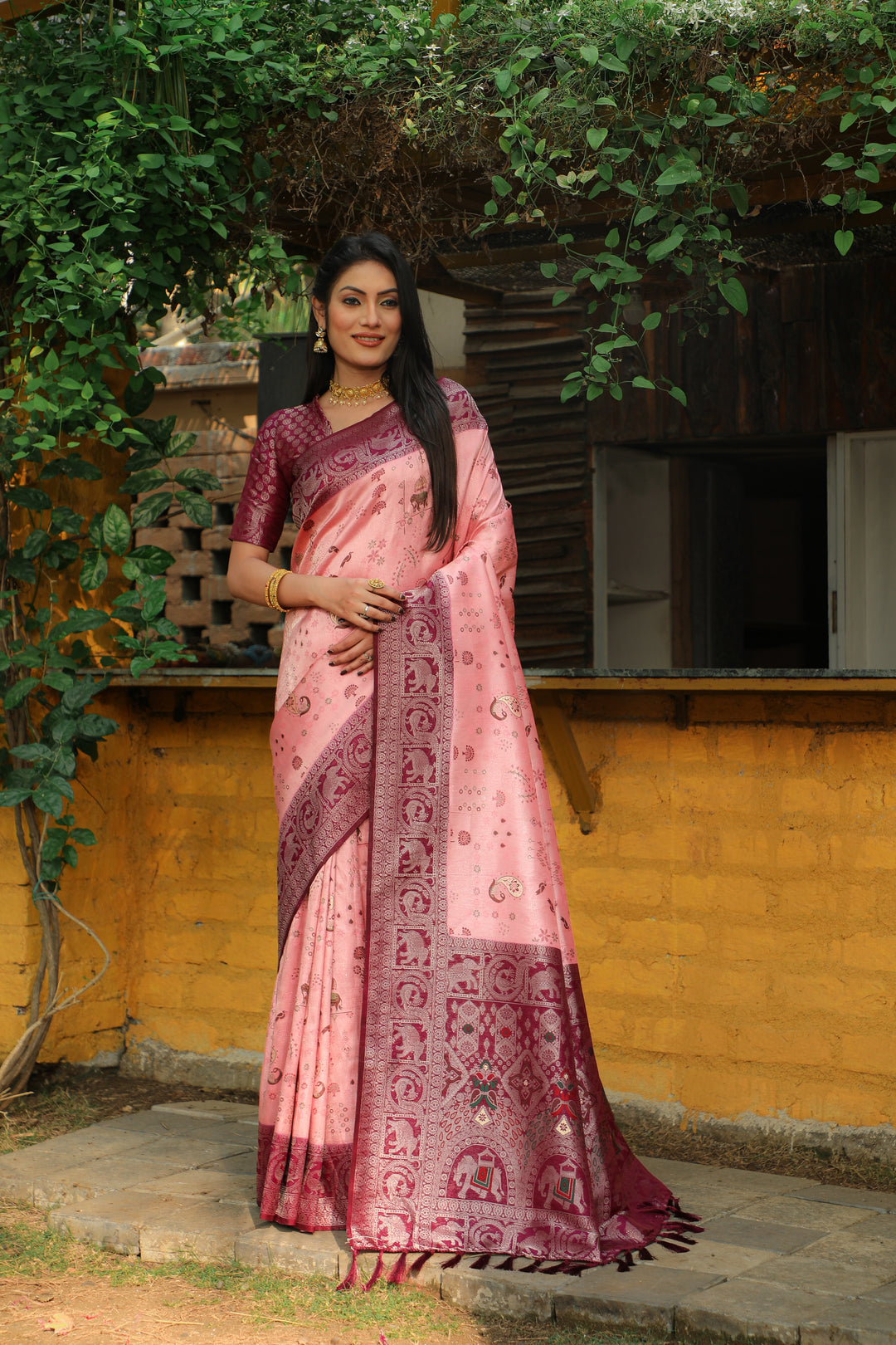 Timeless blue Kanjivaram silk saree with intricate weaving and traditional borders, designed for grand celebrations.