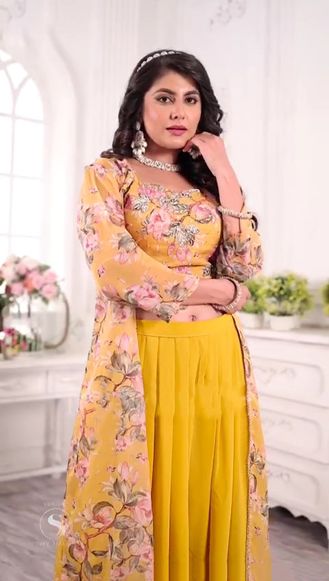 Beautiful yellow georgette palazzo set, perfect for traditional and formal events.