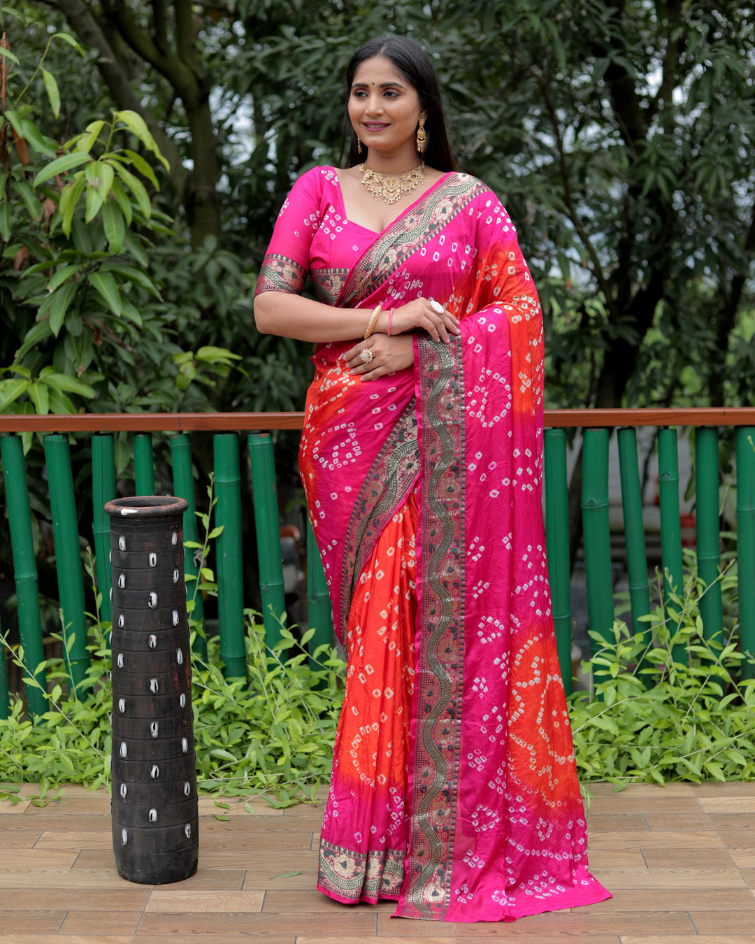 Timeless royal-blue Bandhej Tapeta silk saree with Bandhej tie-dye craftsmanship and rich dual-tone colors.