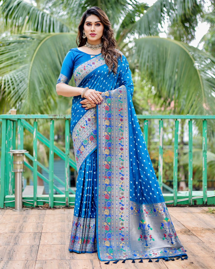 Designer Paithani Bandhej silk sadi in bright pink, purple, and blue with intricate traditional motifs.