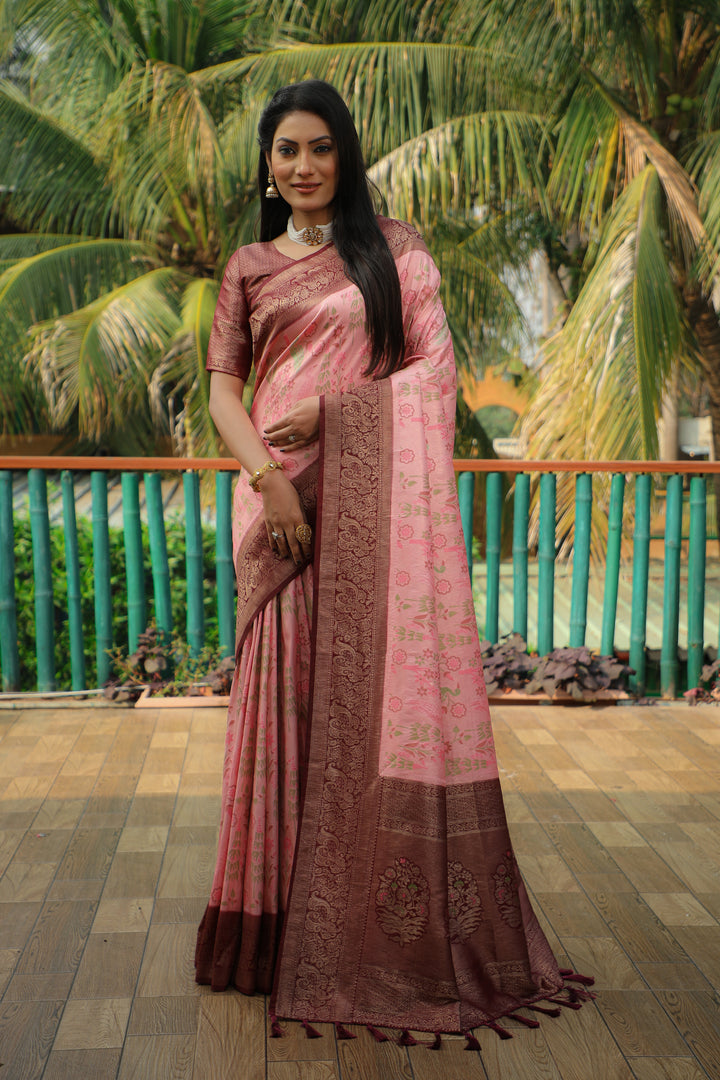 Soft pink Kanjivaram soft silk saree with a heavy blouse, perfect for traditional and grand occasions.