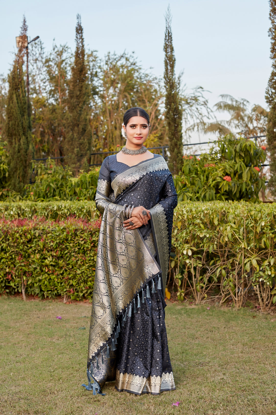 Navy Kanjivaram Satin Silk Saree with intricate Butta and designer border, ideal for special events.