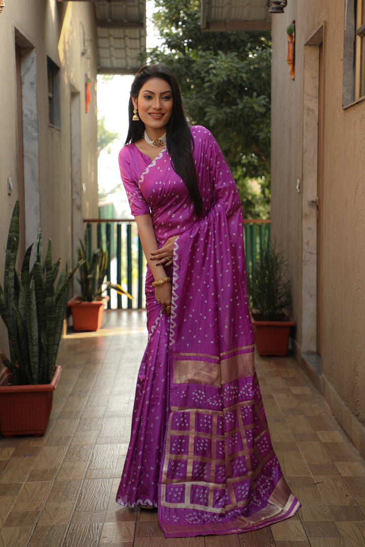 Elegant purple Bandhej silk saree with bold checks pattern, perfect for cultural celebrations.