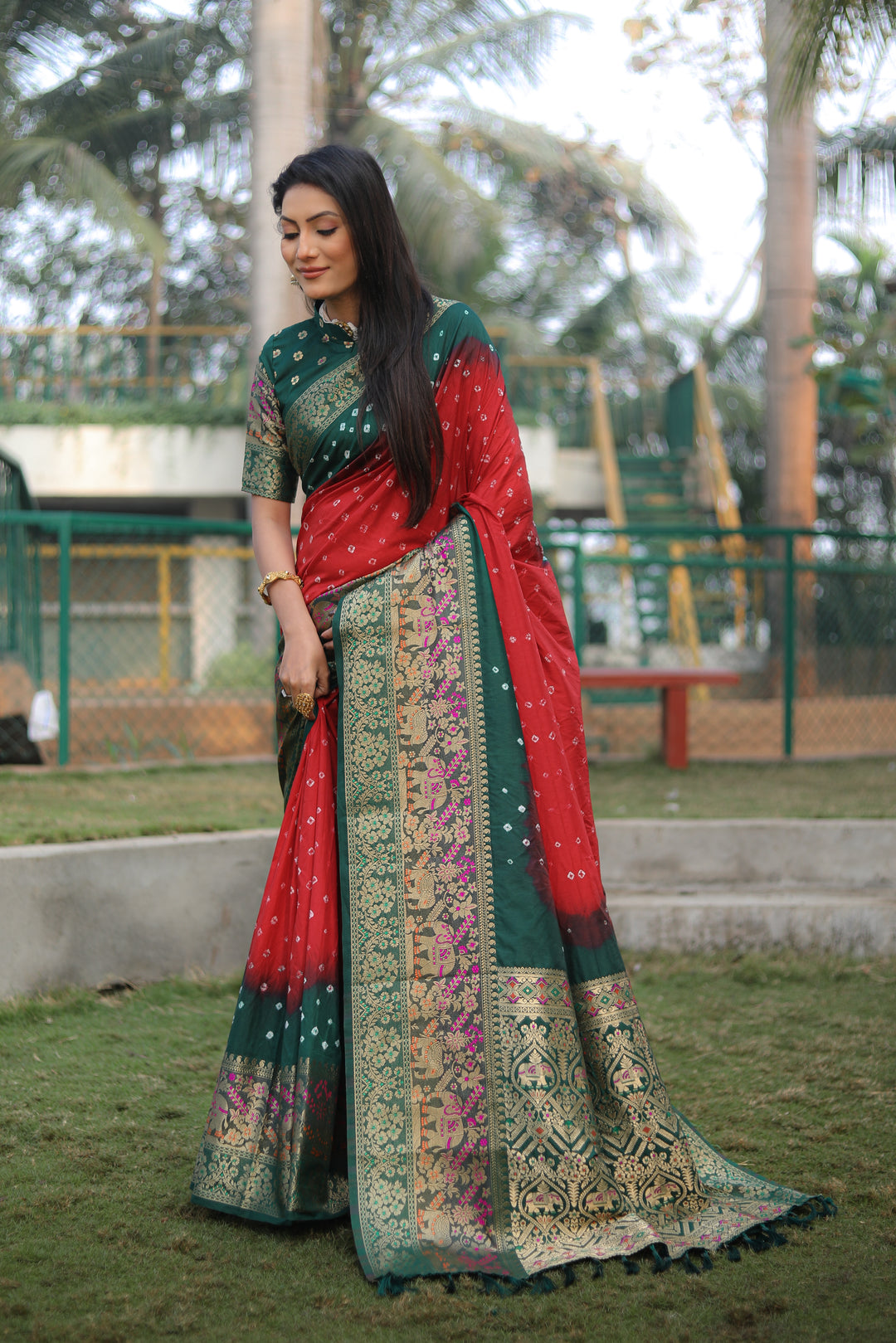 Red Bandhej Silk Saree with exquisite Kanjivaram border and Minakari pallu, ideal for celebrations.