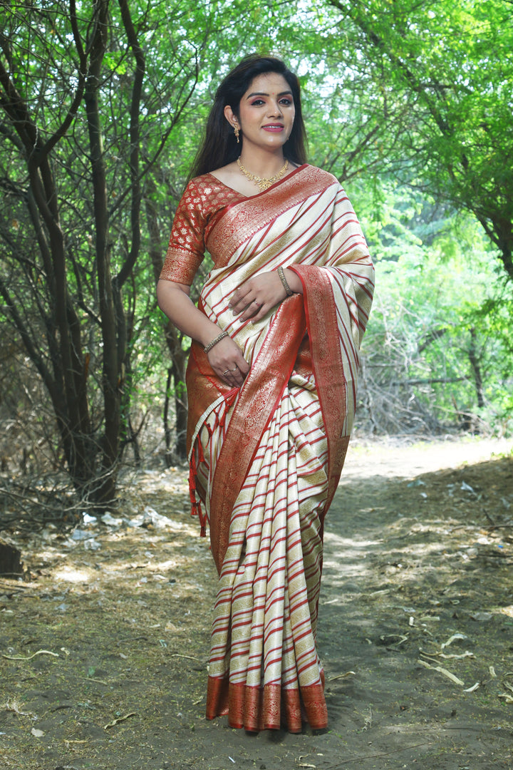 Cream Leheriya Silk Saree with exquisite Zari weaving and elegant border, ideal for traditional occasions.