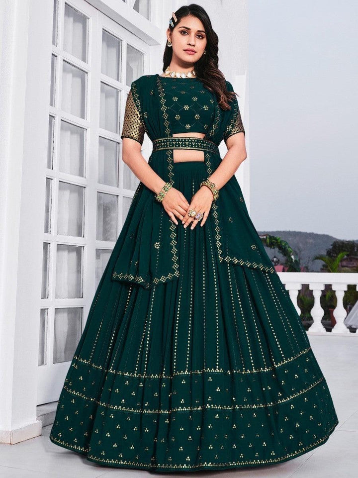 Teal green georgette lehenga choli with embroidery and sequin work.