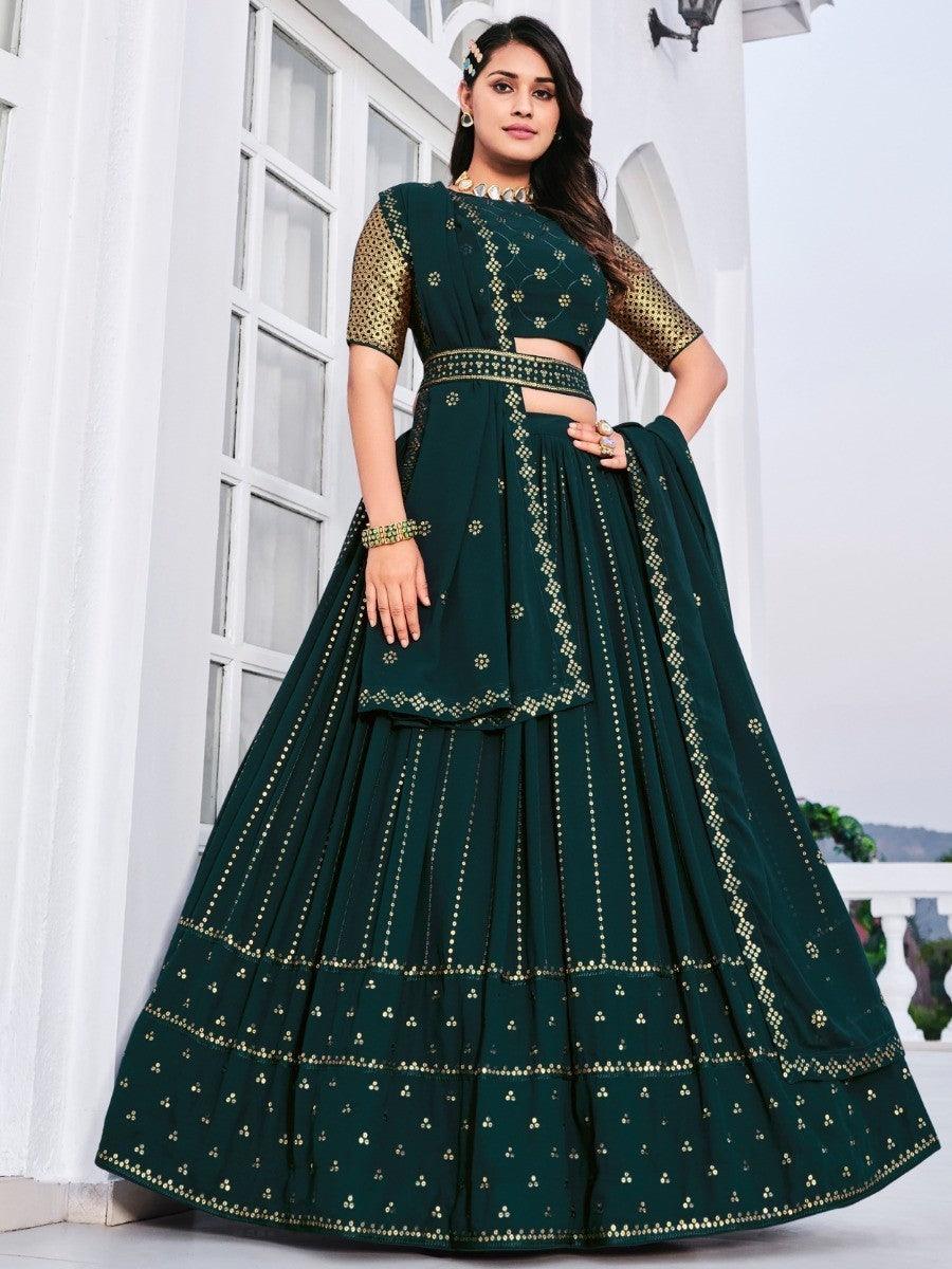 Traditional lehenga with matching dupatta and embroidered belt.