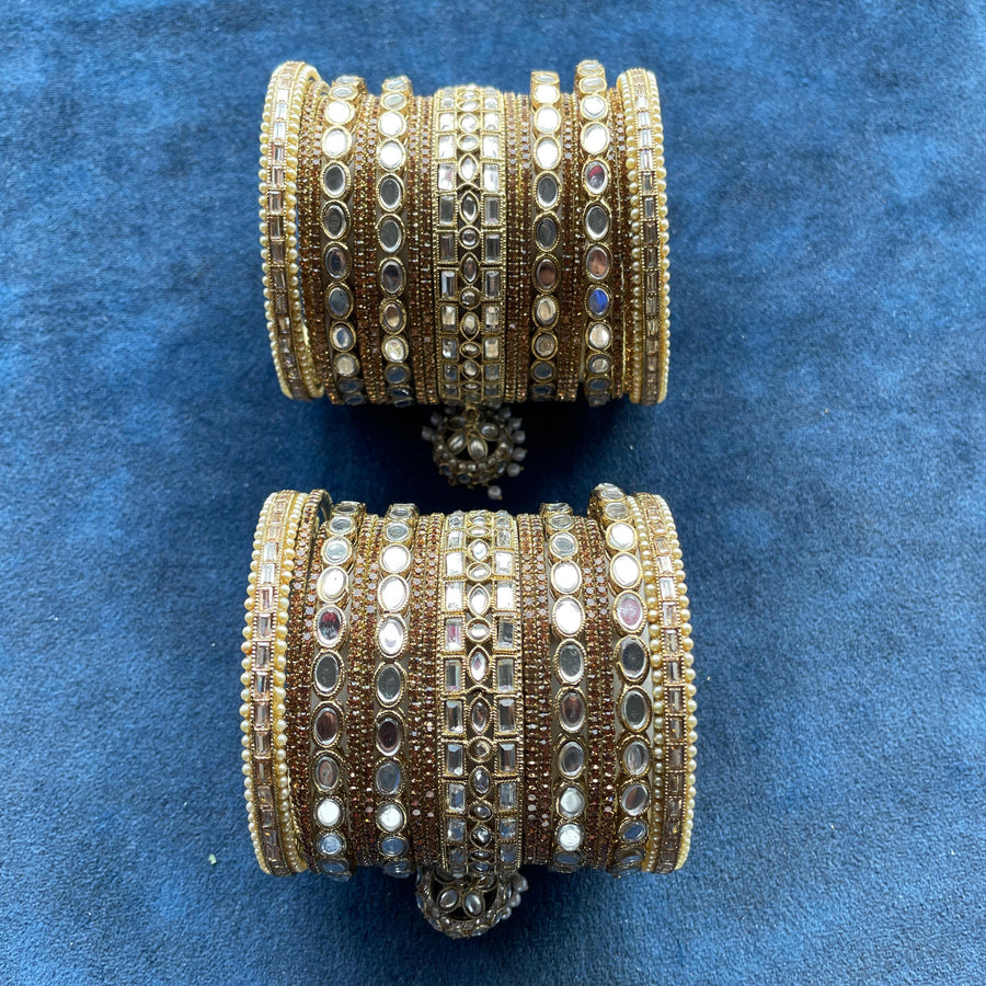 Chuda set adorned with sparkling stones for a dazzling effect.