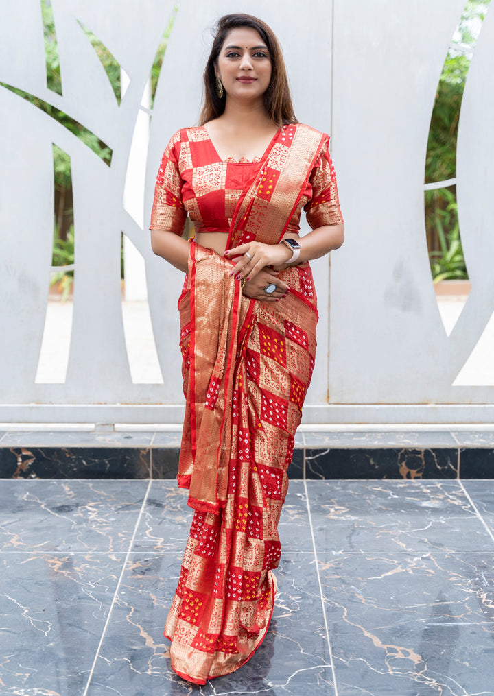 Stunning green Bandhej silk saree with an eye-catching zari border and elegant drape, perfect for bridal occasions.